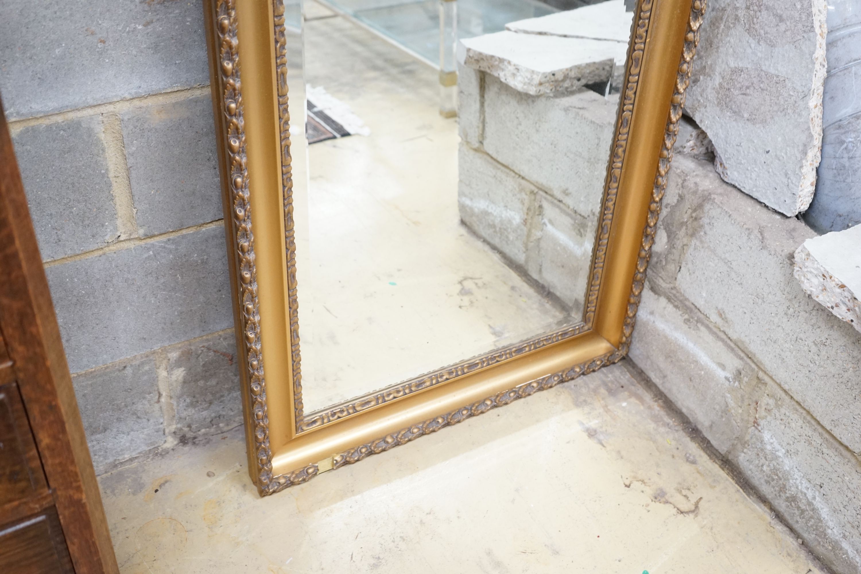 An early 20th century rectangular gilt frame four plate wall mirror, width 78cm, height 137cm